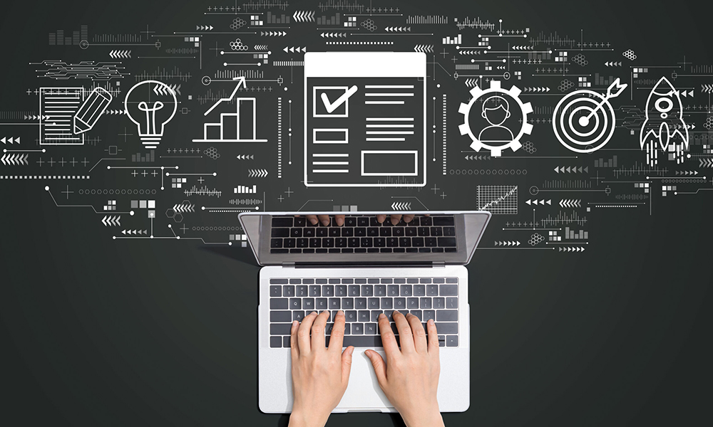 Project management theme with person using a laptop computer